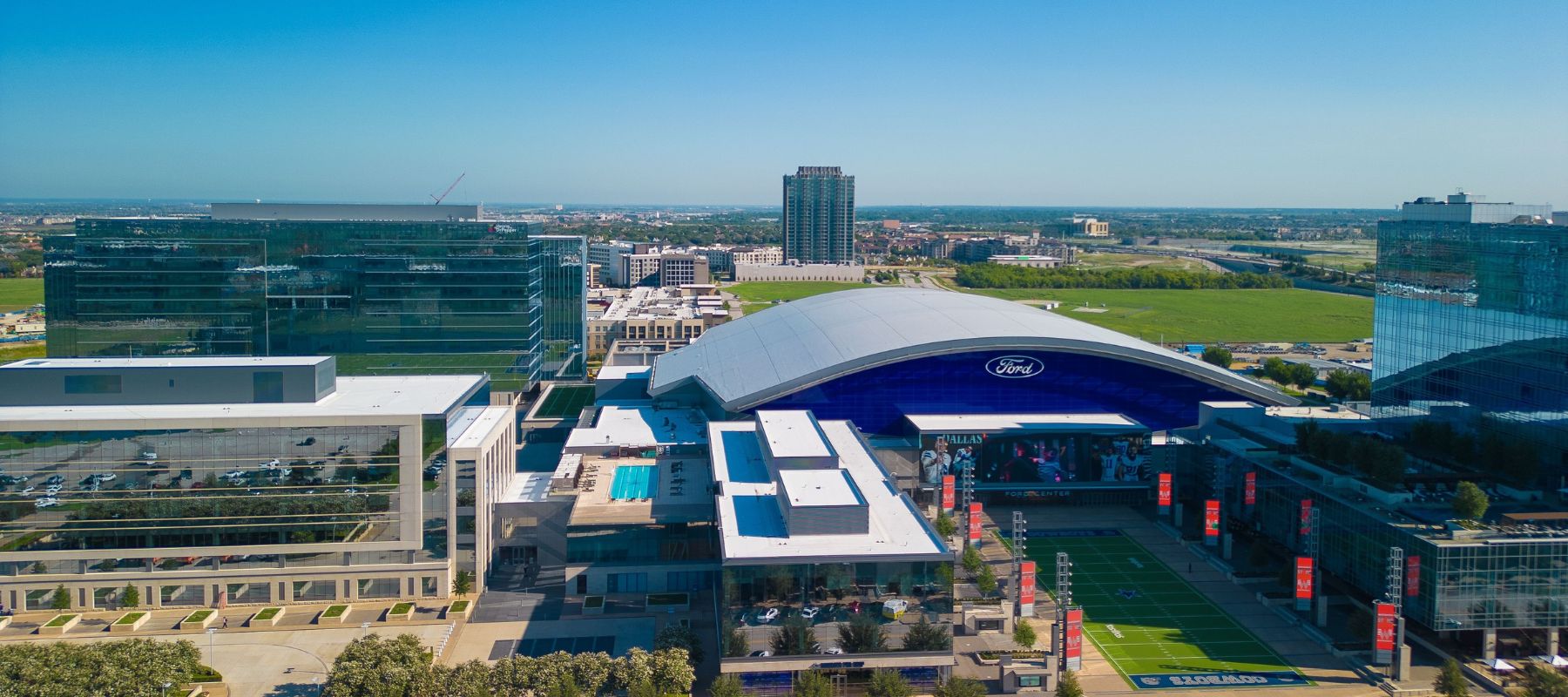 Aerial view of The Star in Frisco, Texas, featuring the Dallas Cowboys’ practice facility and surrounding modern buildings